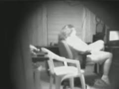 The chubby wife is unaware that her pussy masturbation is being recorded by a covert camera.